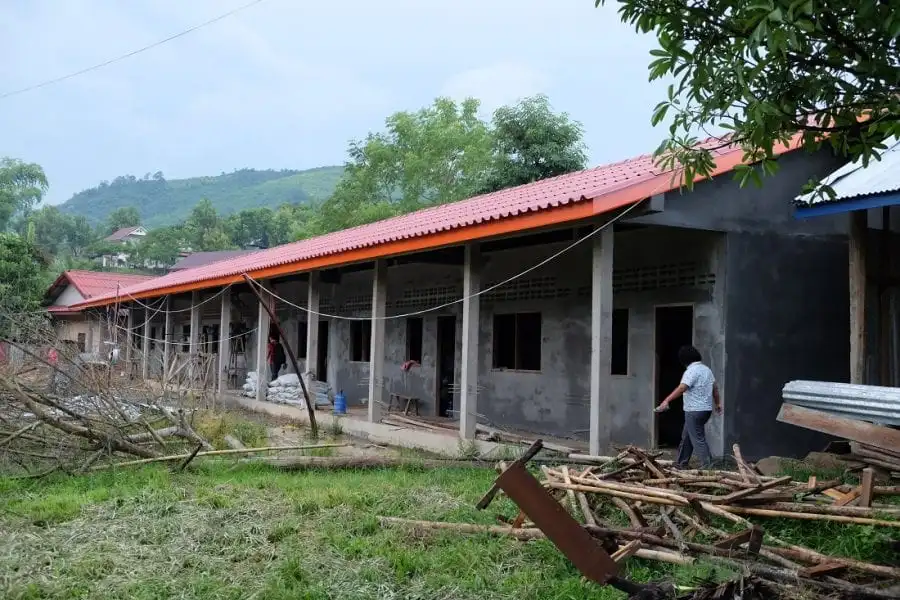 CDF Phonsai School outside, Red title roof with ground soil