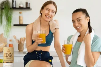 Two girls, after a work out, drinking EDG3 Plus to enjoy its benefits of glutathione for immunity