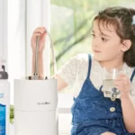 A girl seated, hydrating with HomePure, while reaching for the adjacent HomePure-NovaSoft-Solution-To-Hard-Water