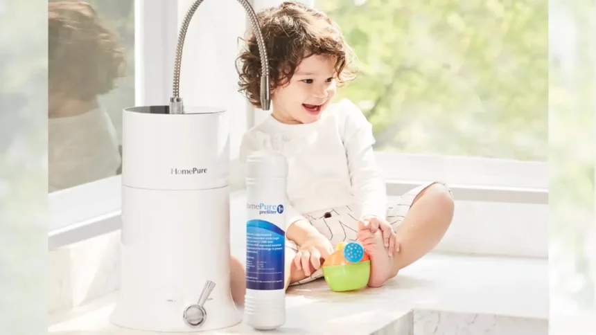 A joyful toddler on a table with toy, alongside HomePure Viva, encouraging a cheerful and healthful lifestyle.