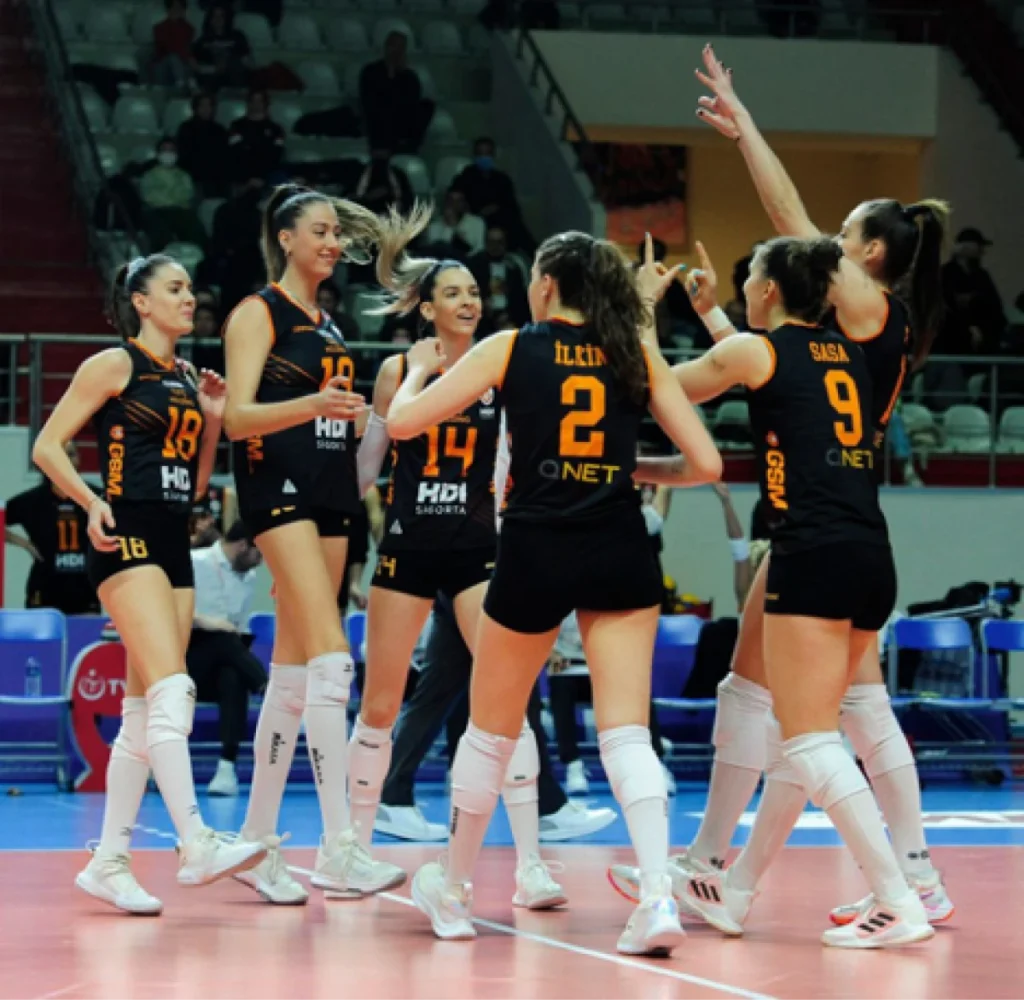 Galatasaray Women's Volleyball Team celebrating after a goal on the court