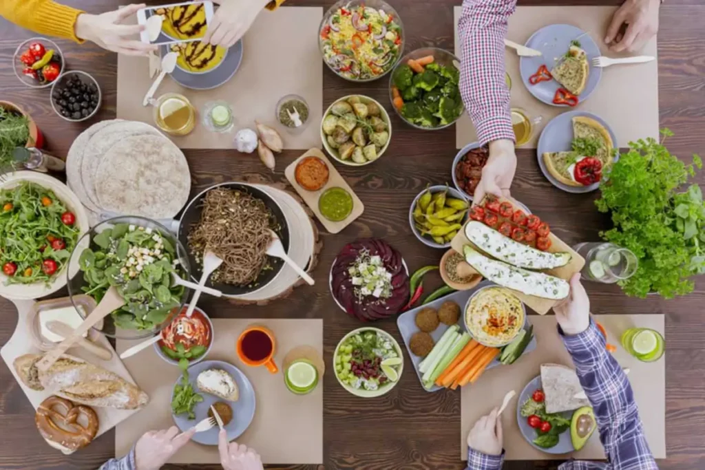 Family dinner gathering with healthy food and bread spread