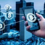 Icons of digital currency Bitcoin floating around man holding smart phone over city skyline