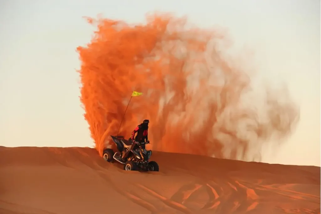 four wheeler motorcycle in desert.