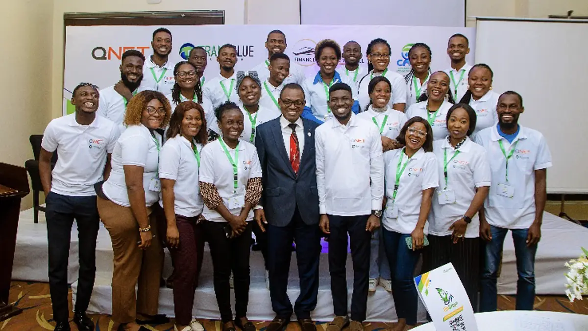Empowering Nigerian Youth: Qnet'S Fingreen Phase 2 Further Ignites Financial Literacy 3 QNET Fingreen event with attendees standing posing for a photoshoot