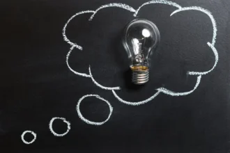 Success tips cloud idea and light bulb