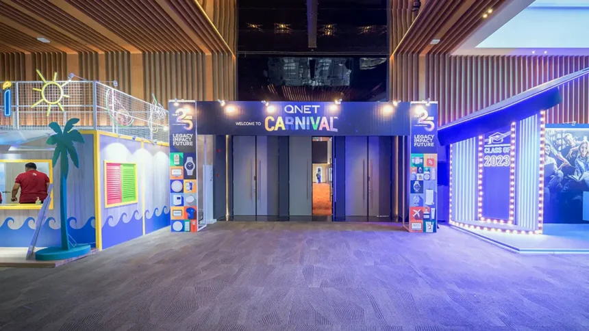 The vibrant entrance of the QNET Carnival, showcasing our commitment to sustainability at V-Convention 2023