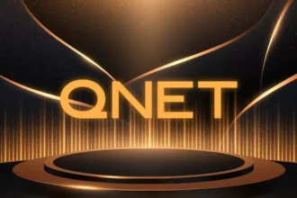 Gold and black banner with the company logo in gold to celebrate awards QNET won in 2023