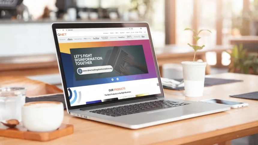 Laptop showing official website to showing QNET website not QNET scams website
