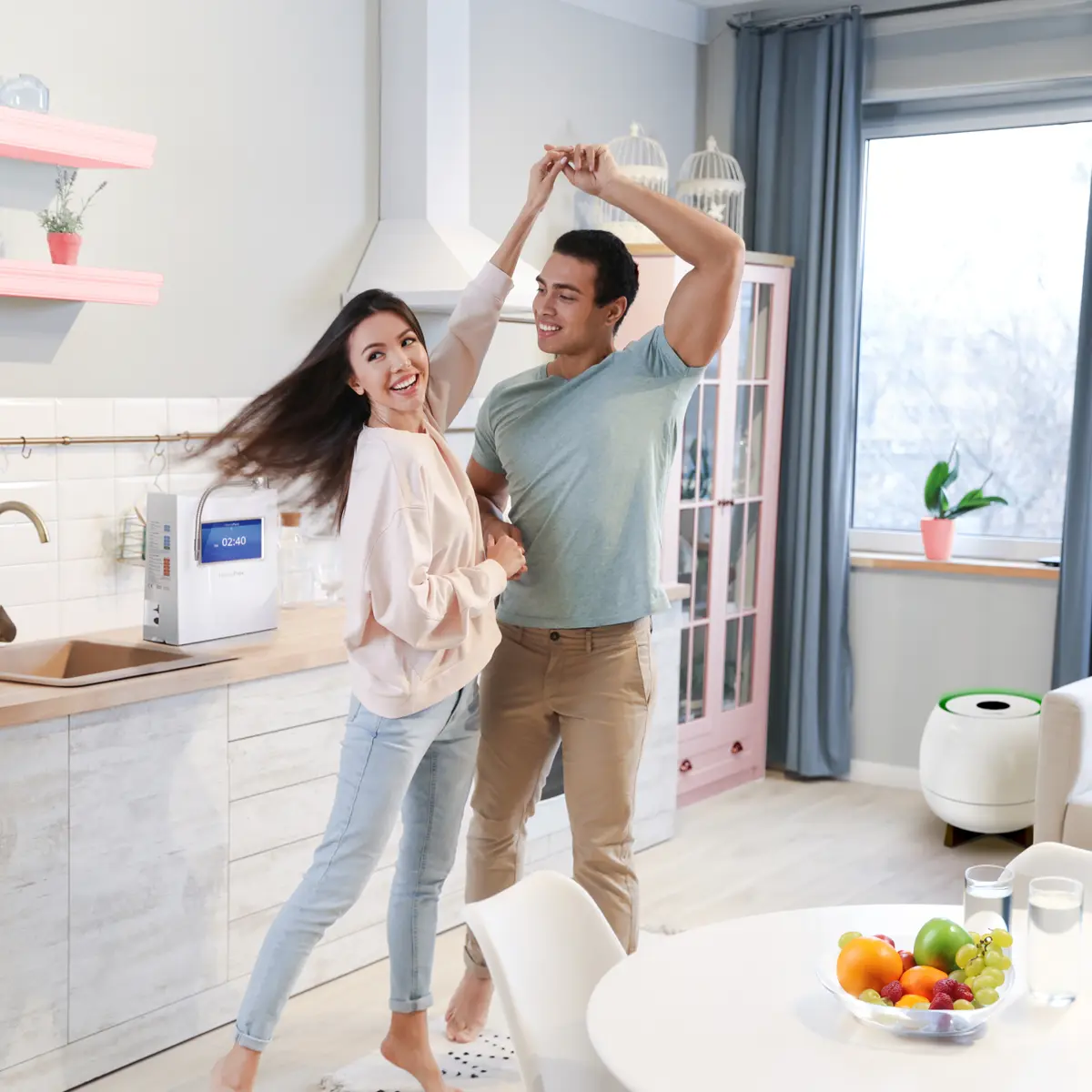 Guy dancing with a girl he considers his QNET Valentine in their HomePure Home