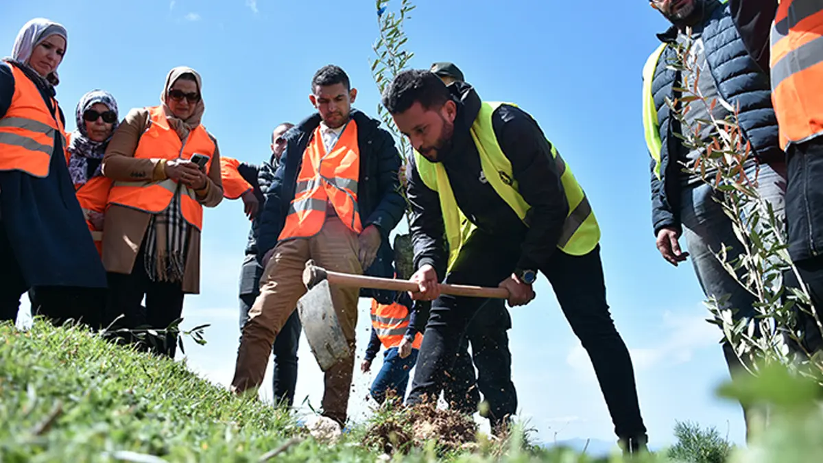 Championing Sustainability And Building A Green Legacy With Qnet 7 QNET Algeria representatives in action as they plant 500 trees as part of reforestation efforts in August to September 2021.